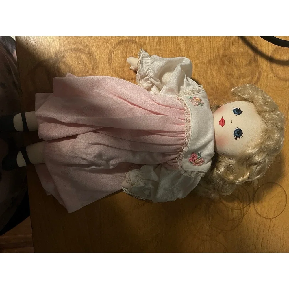 Vintage apple sauce doll with vintage baby dress
